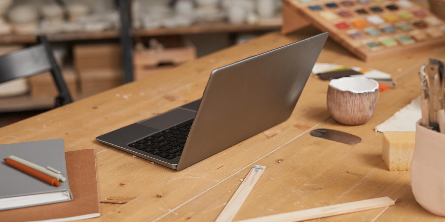 Laptop on wooden desk